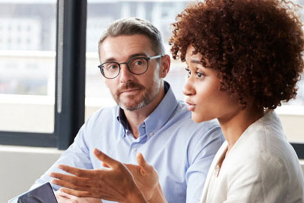 a man and a woman talking