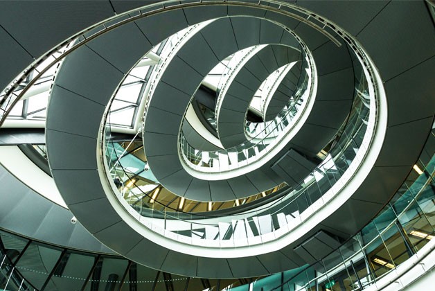 a circular ceiling with a spiral staircase